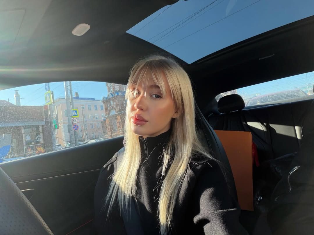 Veronika Mochalova driving a car in the city